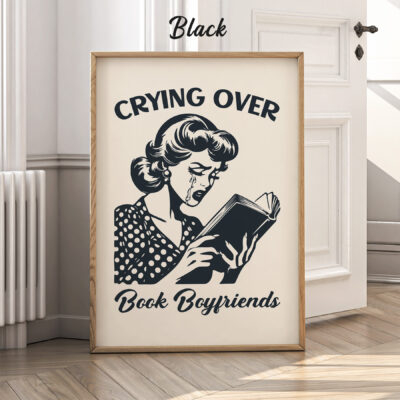 Black version of bookish art print leaning against white wall.