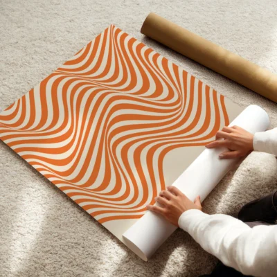 Clean flowing orange lines forming waves on a light background