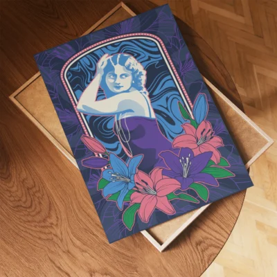 Art print of a stylish figure in a purple dress with floral designs around them, placed on a wooden table.