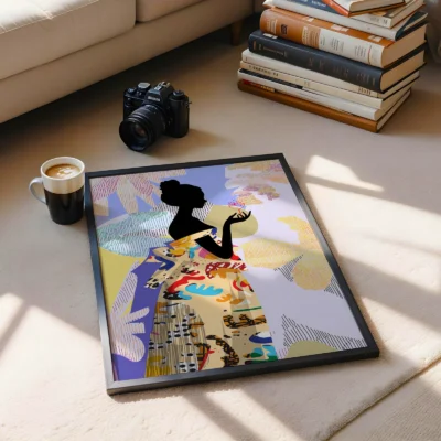 A silhouette of a woman in a colorful abstract portrait on the floor next to a camera and a cup of coffee.