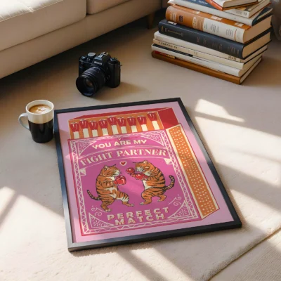 Illustration of two cartoon tigers boxing with the text 'You Are My Fight Partner' and 'Perfect Match', framed on a living room floor