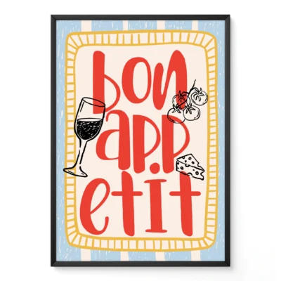 A framed wall art featuring the phrase 'Bon Appétit' with illustrations of a wine glass, tomatoes, and cheese.