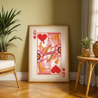 Art print of Queen of Hearts playing card displayed in a stylish room with indoor plants.