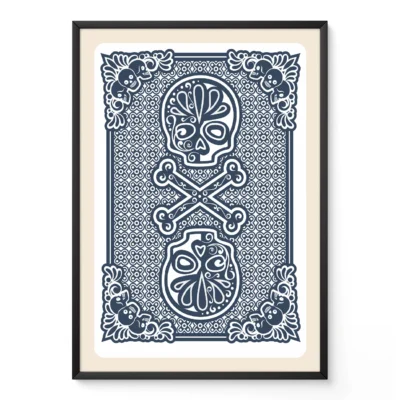 Decorative artwork featuring a skull and crossbones pattern surrounded by floral designs