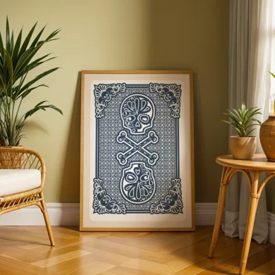 Decorative poster featuring a skull and crossbones with floral designs, framed and displayed in a living room.