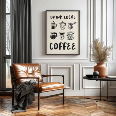 Interior with a leather chair, a wall art poster saying 'Drink Local Coffee', and coffee brewing illustrations