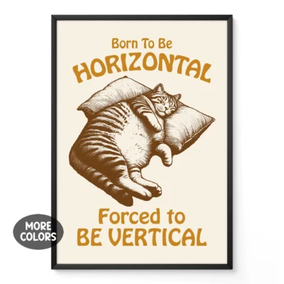 A relaxed cat on a pillow with the text 'Born To Be HORIZONTAL, Forced to BE VERTICAL.'