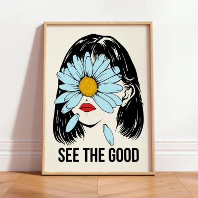 Art print of a woman with a daisy covering her eyes and the text 'SEE THE GOOD' below