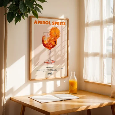 Aperol Spritz vintage cocktail poster on table by window, warm sunlight and retro decor.