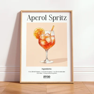 Framed Aperol Spritz vintage cocktail print leaning against wall in minimalist interior.