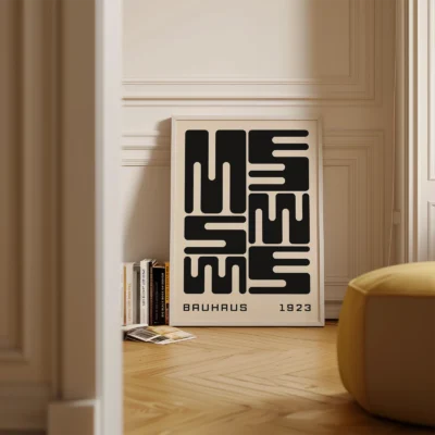 Bauhaus poster art placed on floor, black minimalist typography inspired by Bauhaus 1923.