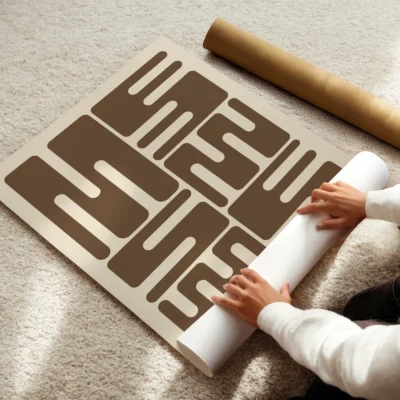 Bauhaus poster art print being rolled, brown wave typography in minimalist Bauhaus 1923 style.