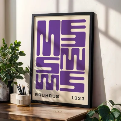 Bauhaus original poster leaning on table, purple wave typography in geometric Bauhaus style.