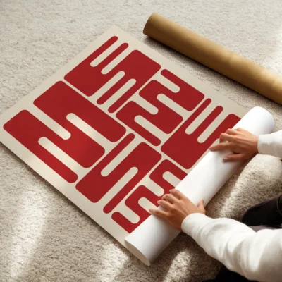 Bauhaus original poster print being rolled, red wave typography in minimalist Bauhaus 1923 style.