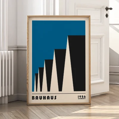 Bauhaus exhibition 1923 factory roofs poster leaning against wall, blue minimalist Bauhaus design.