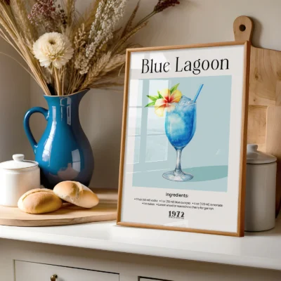 Blue Lagoon cocktail poster on shelf with vase and kitchen decor, soft retro styling.