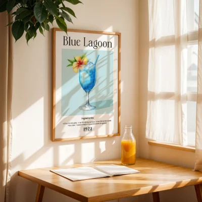 Blue Lagoon cocktail poster on table by window with natural light, airy retro bar aesthetic.