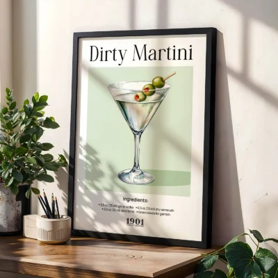 Framed Dirty Martini cocktail poster on shelf with plants, classic vintage bar style.