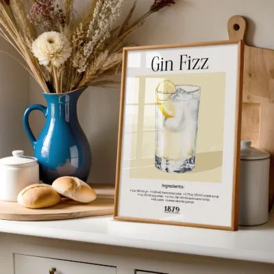 Gin Fizz cocktail wall print styled on shelf with decor, retro watercolor cocktail poster aesthetic.