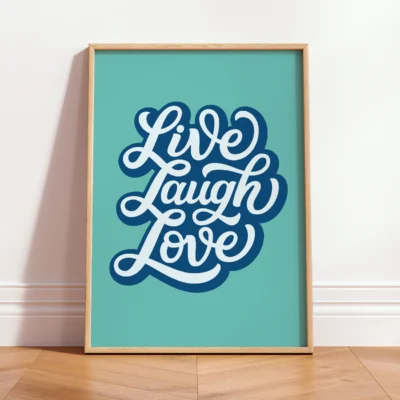 Blue “Live Laugh Love” typography on teal background in wood frame, retro quote wall art.
