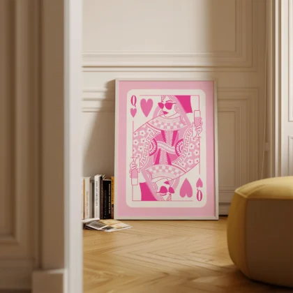 Pink and white Queen of Hearts playing card poster standing on floor in minimalist room, retro style.