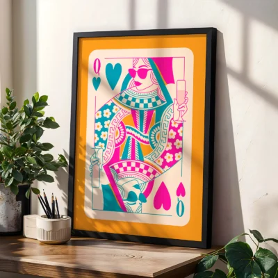 Colorful Queen of Hearts poster in black frame, styled on shelf with plants in a modern interior.