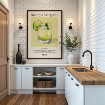 Tommy’s Margarita wall art hanging in kitchen, retro cocktail poster with lime margarita illustration.