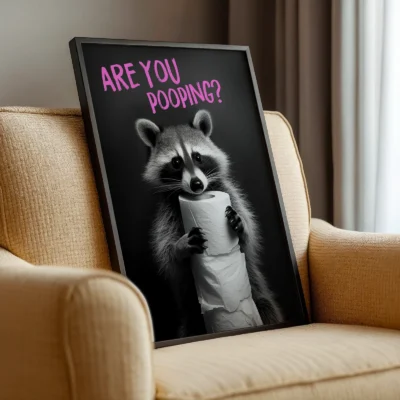 Animal bathroom print angled on chair with raccoon and funny quote