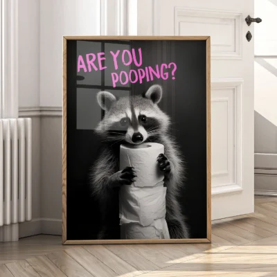 Animal bathroom print placed near door with raccoon and bold message