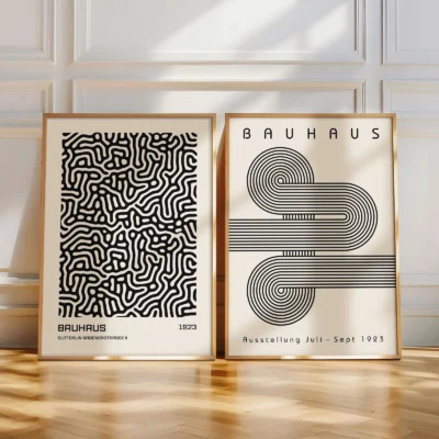 Leaning Bauhaus poster pair with black maze and wave forms