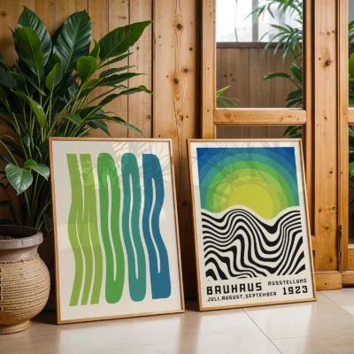 Bauhaus posters with green waves and black sun lines near houseplants