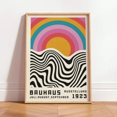 Retro style wall art framed poster leaning on wall in bright interior