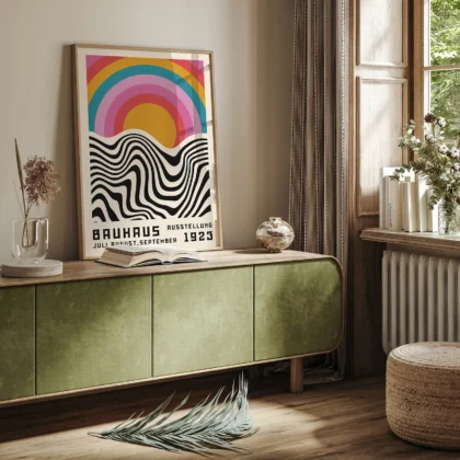Retro style wall art above green sideboard in vintage-inspired room