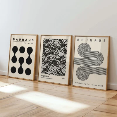 Bauhaus artwork leaning against white wall in sunlit minimalist room