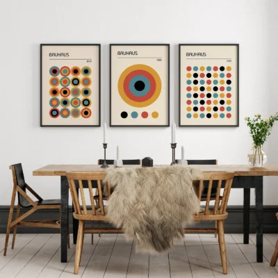 Bauhaus art print trio in dining room with grid and circle designs