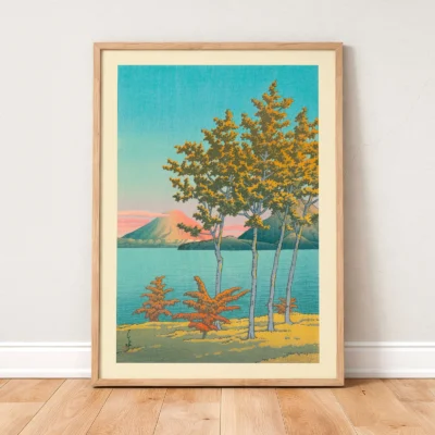 Kawase Hasui poster leaning against white wall on wooden floor with vibrant colors