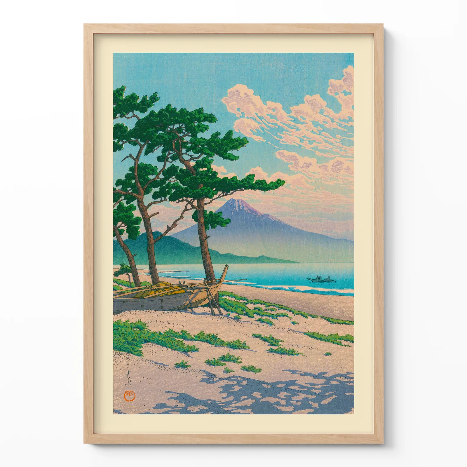 Hasui Kawase art showing pine trees on beach with Mt. Fuji in wooden frame on cream background