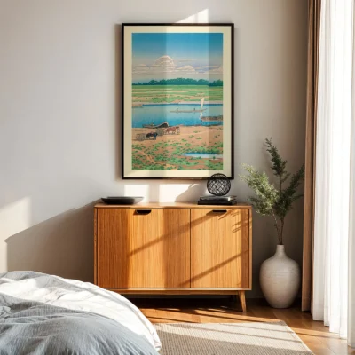 Hasui Kawase print above wooden sideboard with sunny light and traditional landscape