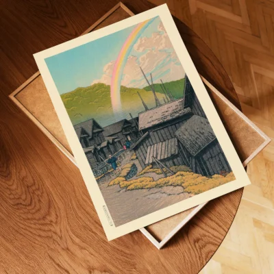 Unframed Kawase Hasui artwork of rainbow over wooden rooftops placed on wooden tray