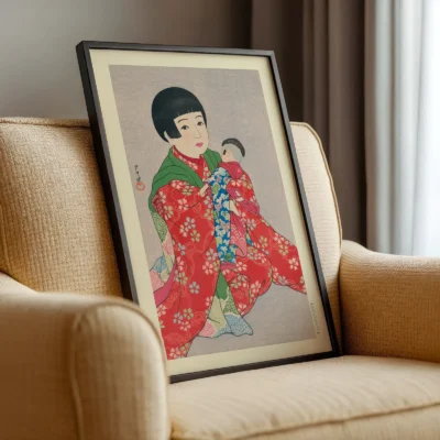 Japanese art print on beige armchair, portrait of child in floral kimono holding doll