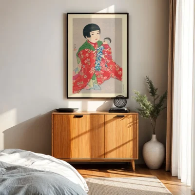 Japanese art print framed above wooden cabinet, child in red kimono with neutral backdrop