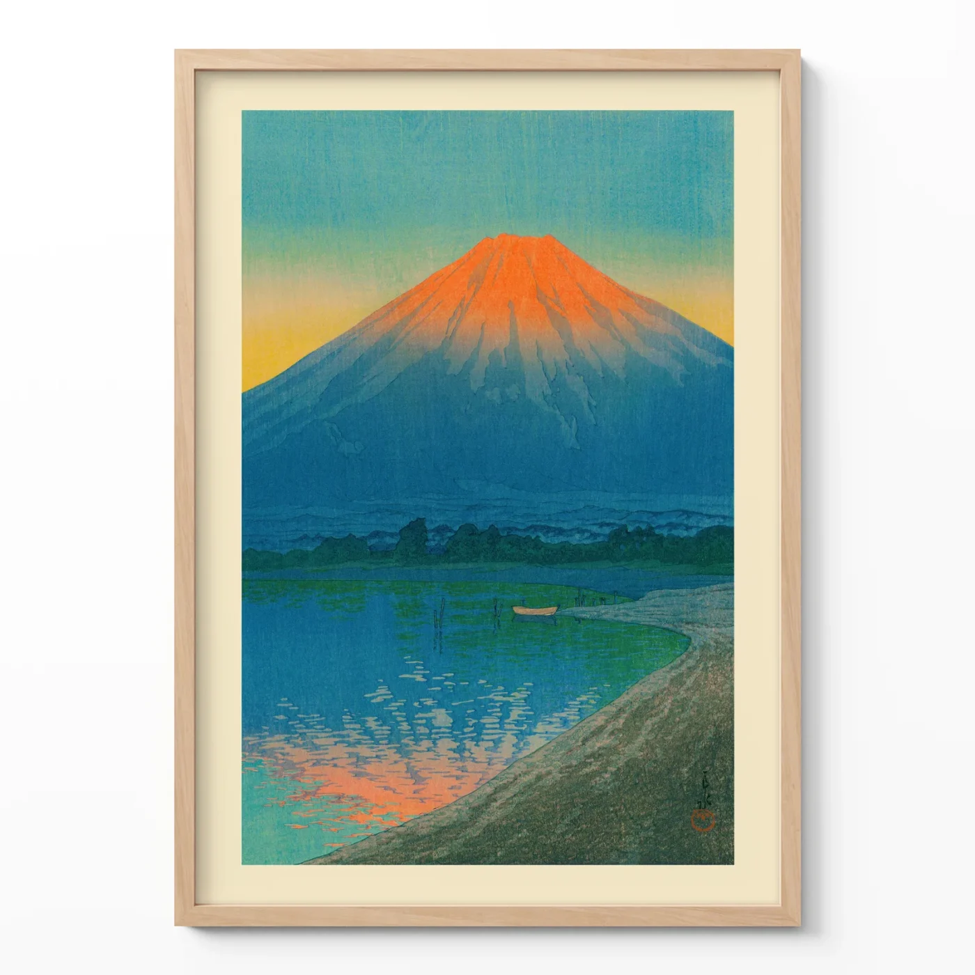 Japanese print showing Mount Fuji at sunrise with lake reflection in wooden frame
