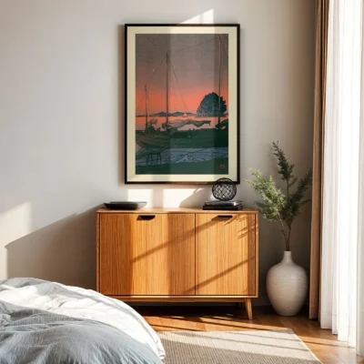 Japanese poster above wooden sideboard, sunset harbor framed in natural daylight