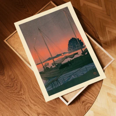 Unframed Japanese poster of harbour at dusk placed on wooden tray