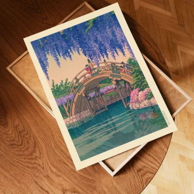 Unframed Japanese woodblock print of wisteria over water on wooden tray