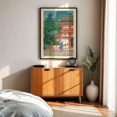 Japanese wall art above wooden cabinet, framed shrine print with umbrella figure