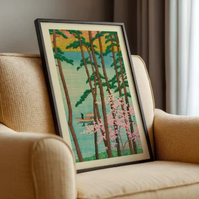 Angled view of Kawase Hasui Arashiyama woodblock print on a chair