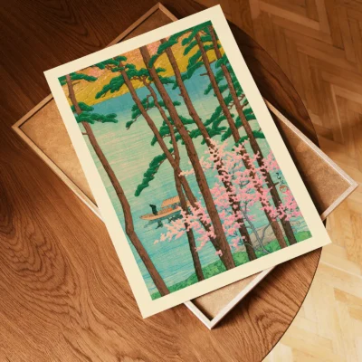 Unframed print of trees and blossoms on wood surface